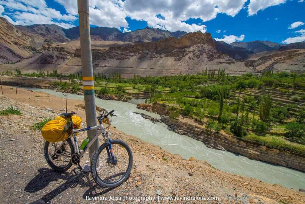 Mountain bike next to river Indus